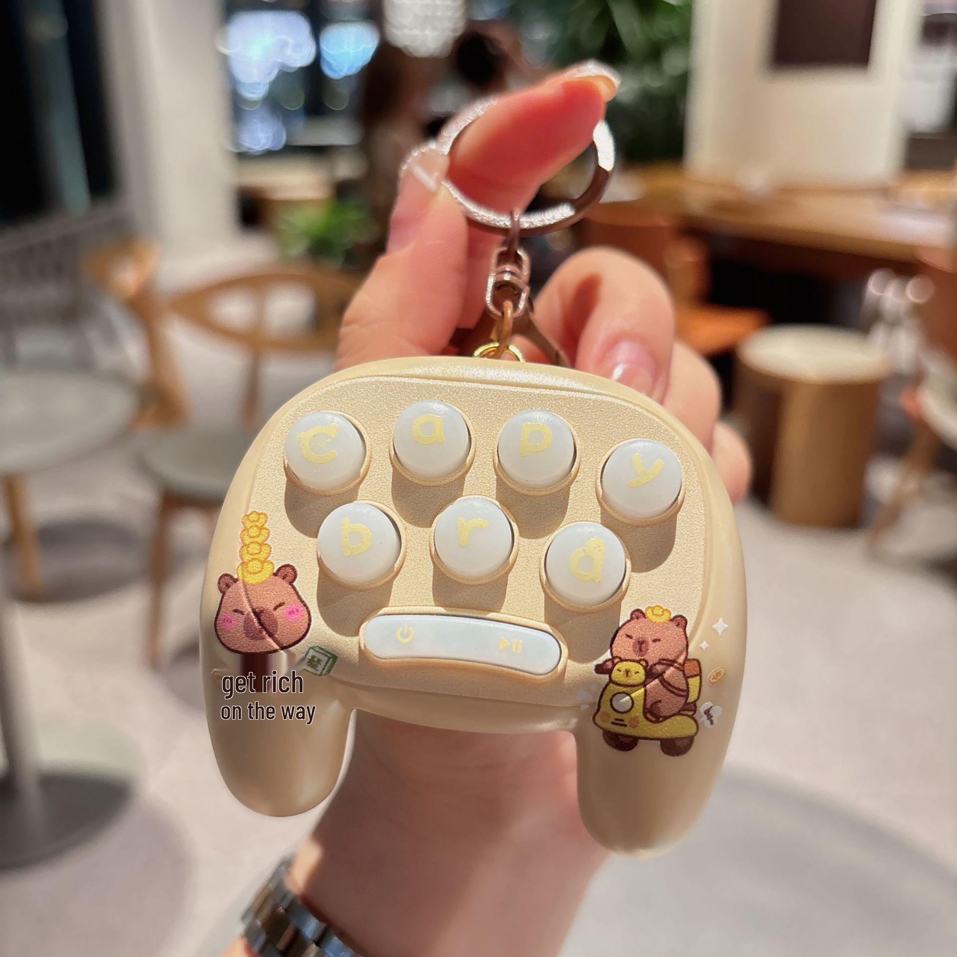 

Mini Cartoon Capybara Whack-a-Mole Keychain Game Pendant