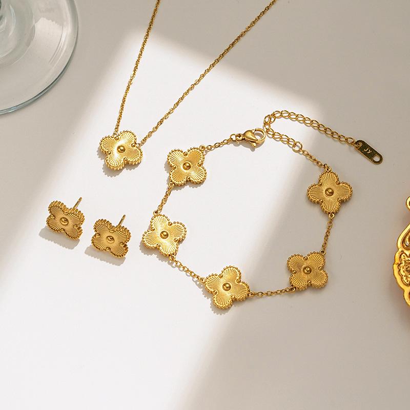 Elegant Four-Leaf Clover Necklace & Bracelet Set - Titanium Steel, Laser-Cut Design, Stylish for European & American Fashion.