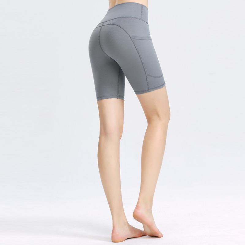 New Yoga Shorts Female High-waisted Hip-lifting Sports Shorts Elastic Tight Pockets Running Fitness Four Pants