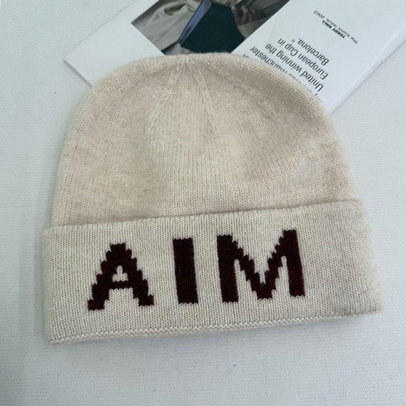 Niche personalized letter knitted hat children's autumn and winter new wool hat warm ear protector bag head cold hat