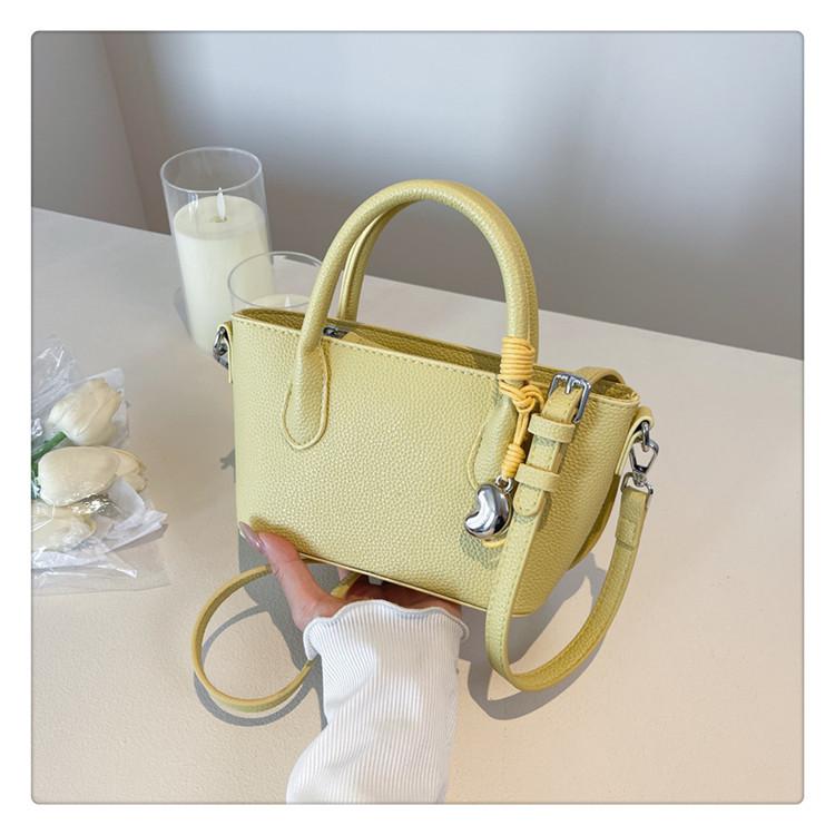 

Portable temperament bucket bag women s summer new solid color casual shoulder bag textured messenger bag