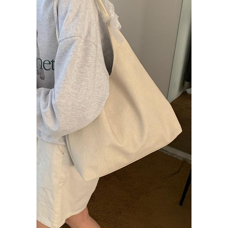 

Fashion denim large-capacity tote bag women s 2025 summer new simple shoulder bag Korean version casual armpit bag