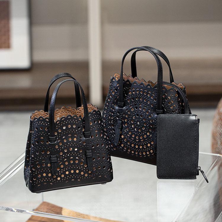 Velkoobchodní továrna prémiová niche vyřezávaná dutá taška na zeleninu Mina kožená dámská taška přes rameno crossbody tote taška