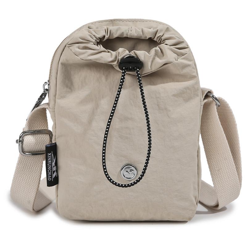 

Japanese mobile phone water cup integrated bag drawstring bag portable messenger shoulder bag commuting light cycling bag key bag tide бежевий