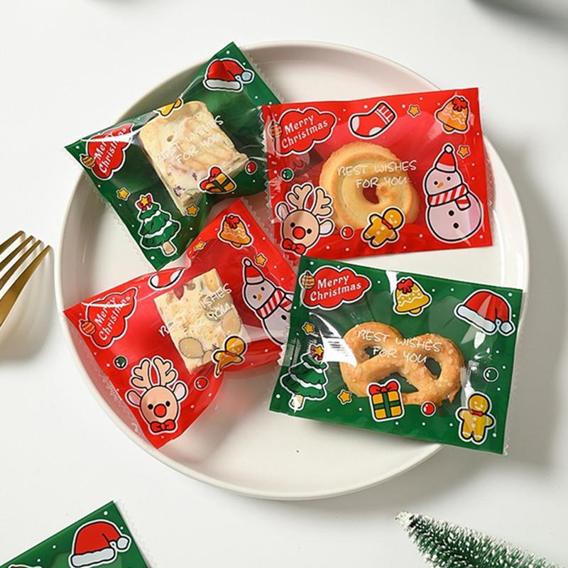100Pcs 7x10cm Plastic Christmas Machine Sealed Bags Snowflake Pastry Candy Cookie Xmas Party Gift Packaging Supplies