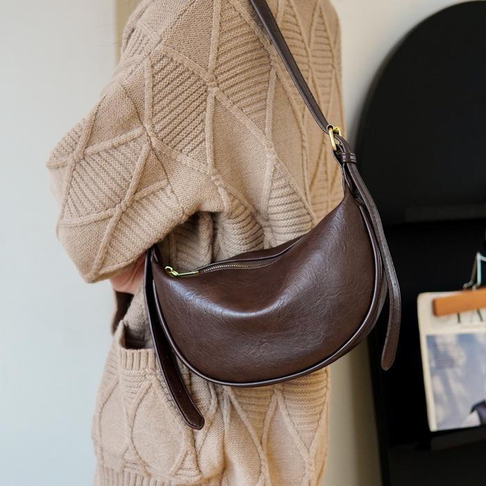 

Crossbody, dumpling bag, high-end niche design bag women s 2025 new Korean version of fashion single shoulder crossbody bag