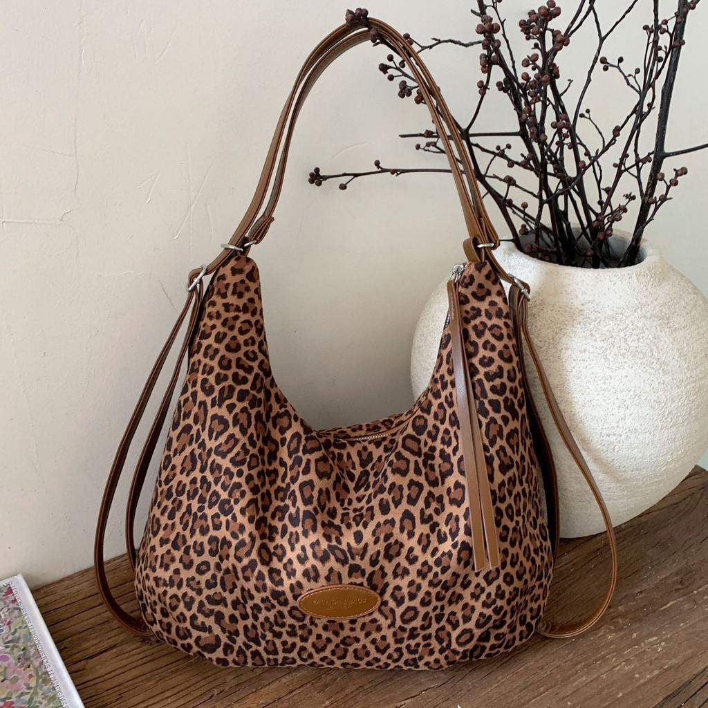 Mode Retro Rucksack Damen 2025 neu große Kapazität Leopardenmuster Tragetasche Pendler Umhängetasche für die Arbeit