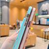 Applicable to iphone17pro mobile phone case Apple hollow love + bracket wristband new 15 Apple 16promax