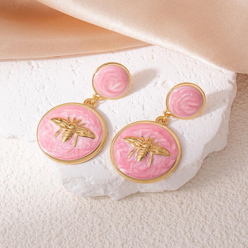 Elegantní nerezové náušnice s kapkami oleje ve tvaru včely