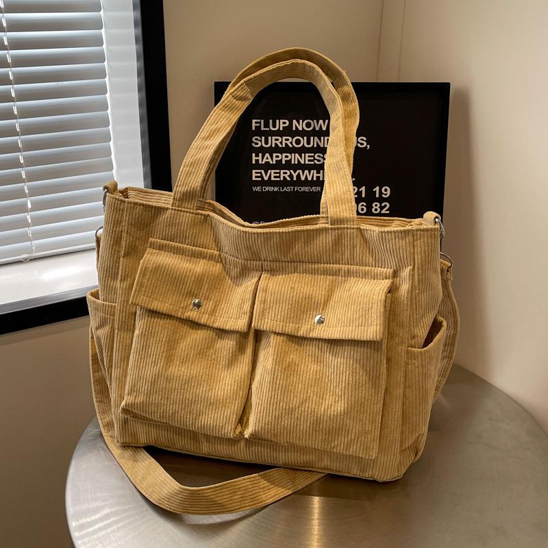 

2025 new large-capacity striped velvet tote bag niche versatile casual shoulder bag Korean version commuter handbag crossbody bag хаки