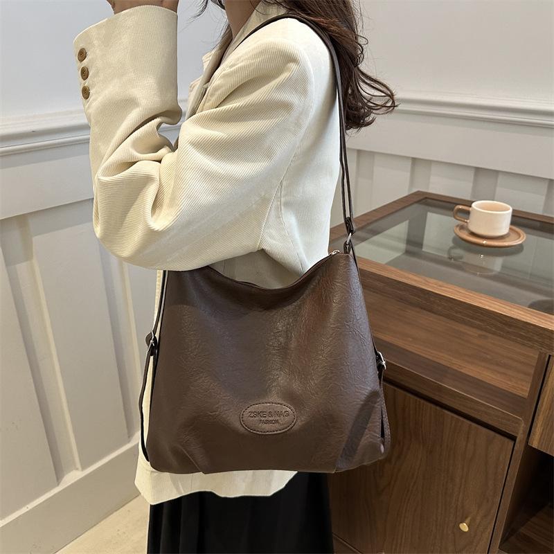 2025 Autumn New Korean Version Fashion Casual Shoulder Tote Bag Large Capacity Commuting Niche Simple Double Shoulder Women's Bag