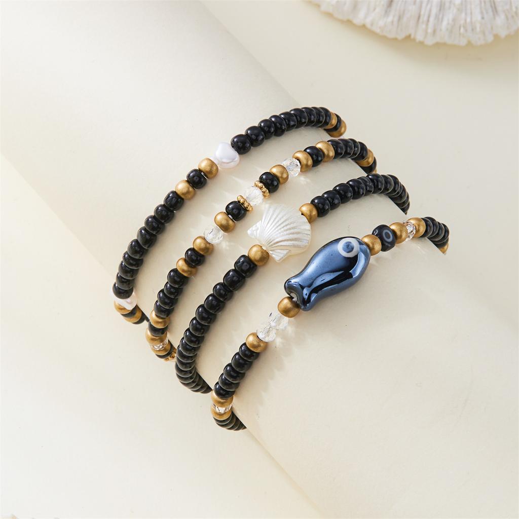 Dehnbare Muschelarmbänder Stapelbarer Strandschmuck Keramik-Fischperlen-Design Handgefertigt Sommer Armband Zubehör