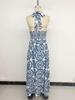 2026 Women's Summer Beach Halter Print Long Dress - Backless, Sleeveless, and Perfect for Vacation.