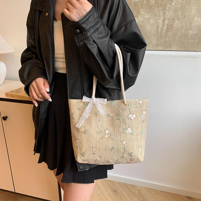 Woven bag new summer niche design bucket bag small fresh simple lace woven bag