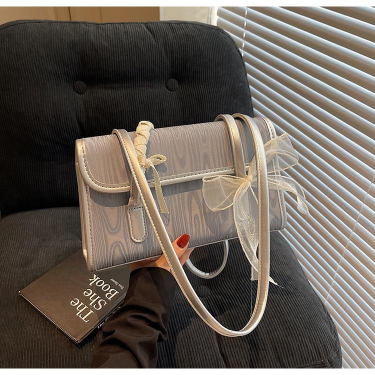 Fashion temperament underarm bag women's spring popular bow small square bag commuter shoulder handbag