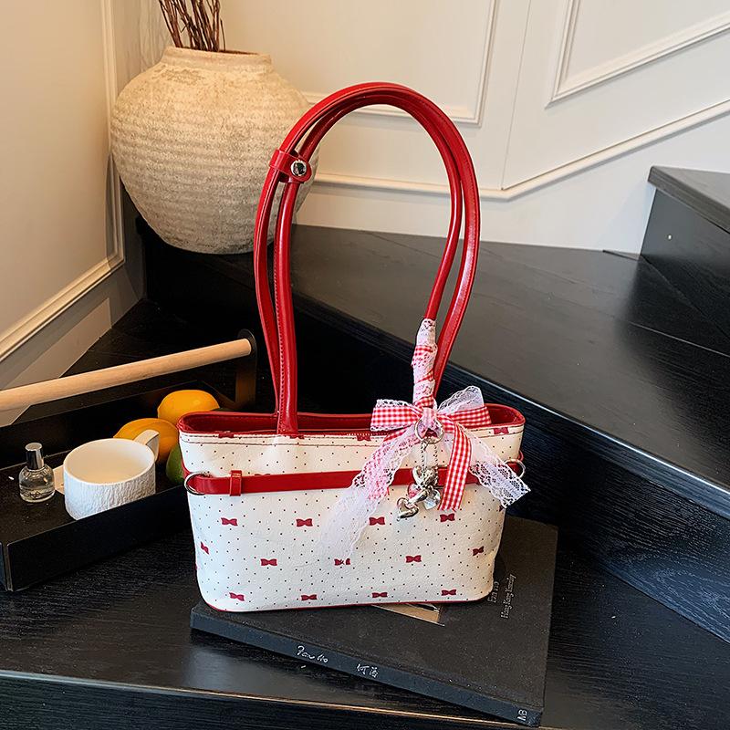 Été super feu rose nœud sac oreiller portable sac pour femme 2025 nouveau sac à bandoulière haut de gamme style ballet