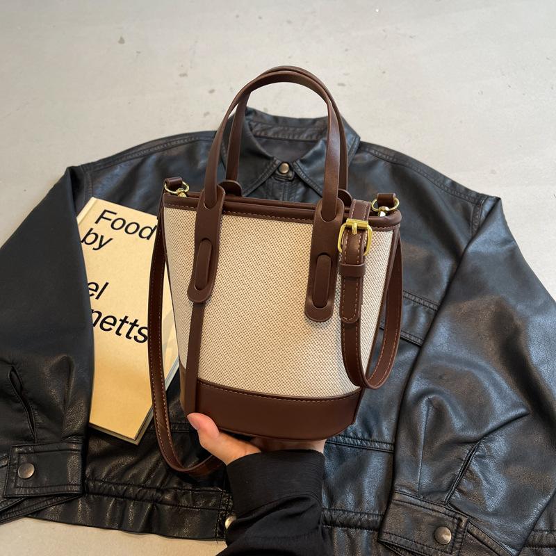 1 szt. 2025 Wybuchowa kontrastowa torba typu wiadro damska uniwersalna torba na ramię do pracy w mieście prosta torba premium wiatrówka