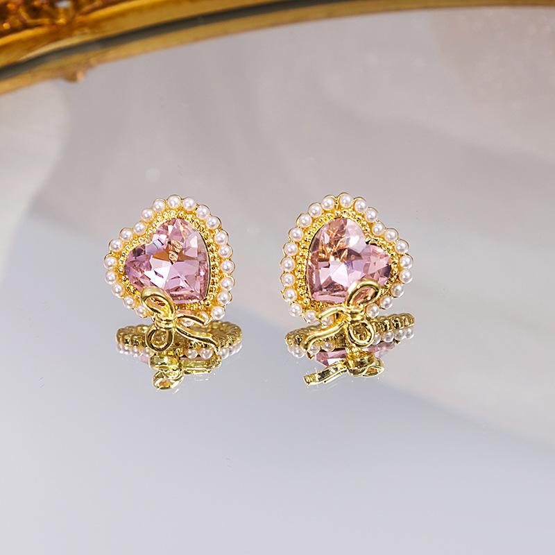 Bezaubernde rosa Schleifenohrringe mit glänzender Zirkondekoration, Liebling der Mädchen