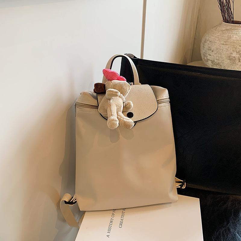 

Новый модный однотонный школьный рюкзак, фактурный рюкзак для девочек, женский рюкзак, красивая дорожная сумка, студенческая сумка Without pendant