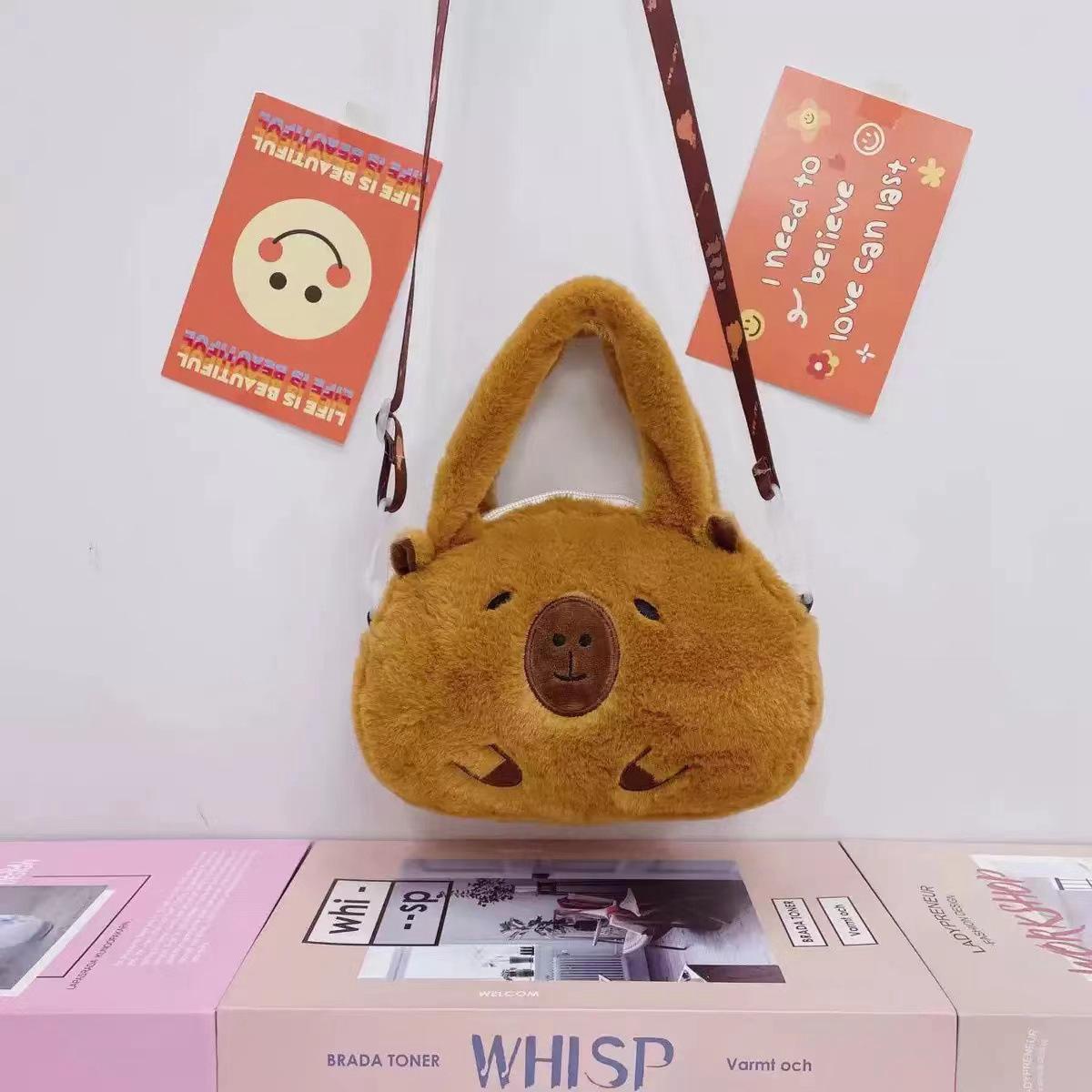 

Мультфильм Зима Новая Капибара Капибара Плюшевая Сумка Посыльный Сумка Плюшевая Игрушка 25*20CM（0.095KG）