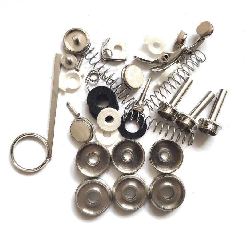 B-flat Trumpet Repair Kit: Screws, Springs, Felt Pads, Cork, Water Key, Brush, Universal Keys.