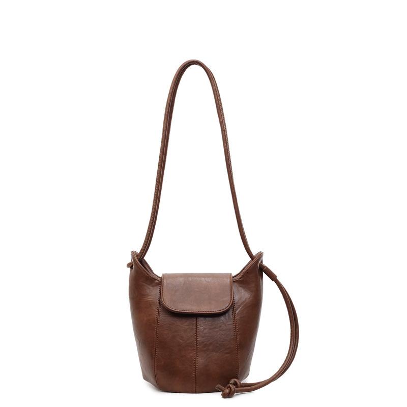 

Minimalist Leather Shoulder Bag with Drawstring Closure and Flap Design Perfect for Daily Use and Casual Styling коричневый