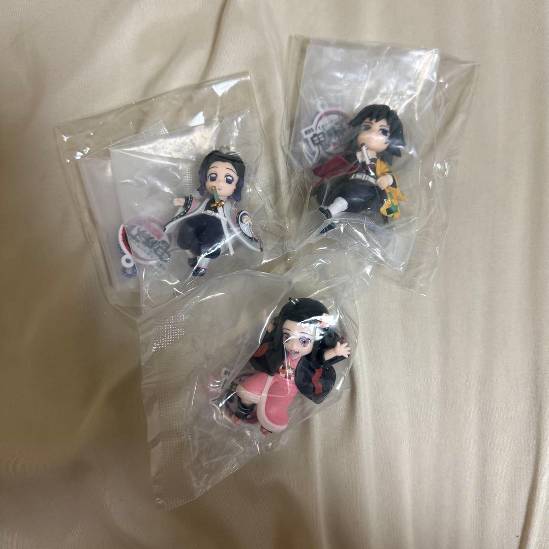 

[USED] Demon Slayer: Kimetsu no Yaiba Mugen Castle Arc Charm Figures: Giyu Tomioka, Shinobu Kocho, and Nezuko