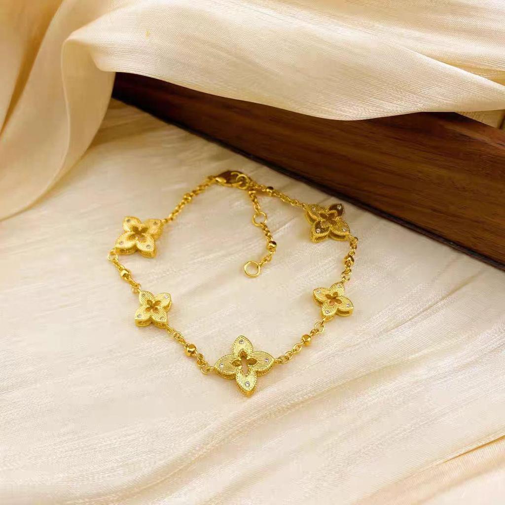 TikTok-Style Four-Leaf Clover Diamond Bracelet: Women's Luxurious Gold-Tone Titanium Steel Jewelry