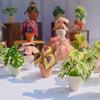 Decoração de casa – Flores e coroas artificiais