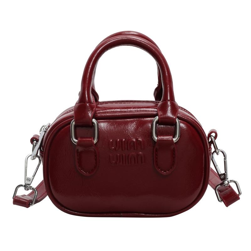 2025 new oily mini handbag bag niche lipstick bag crossbody parent-child small bowling bag women's bag