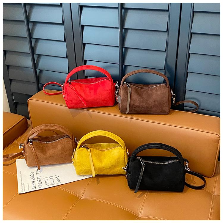 Suede bag women's autumn and winter 2025 new fashion niche design messenger bag matte retro portable pillow bag