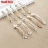 NAIERDI Ivory White Cabinet Handles Zinc Aolly Kitchen Cupboard Door Pulls Drawer Knobs European Fashion Furniture Handle
