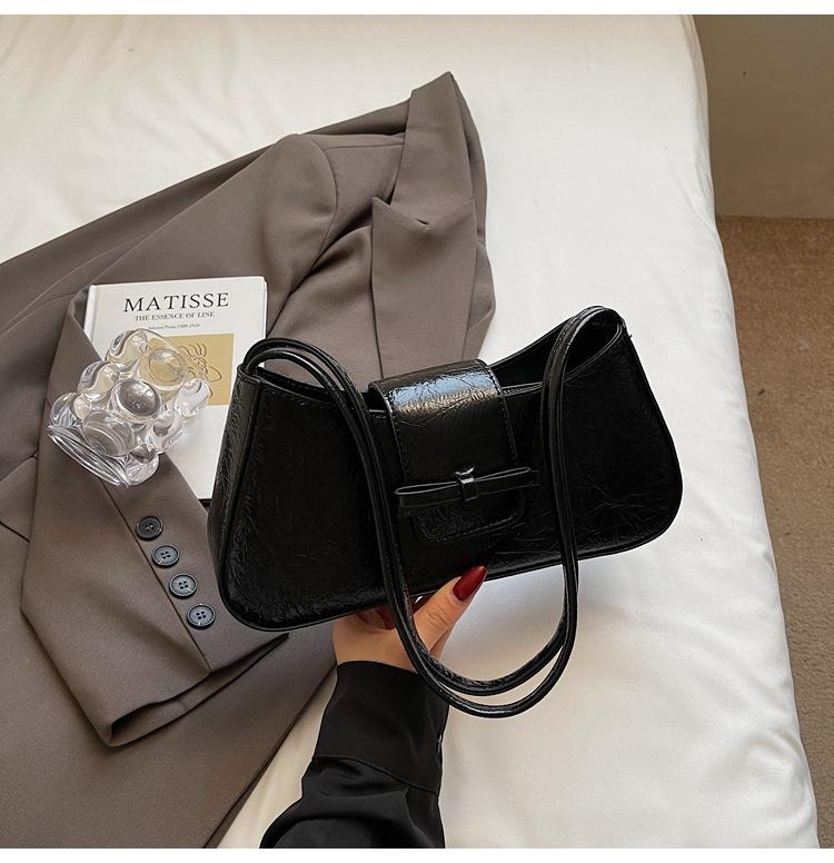 

2025 summer new Korean niche design baguette bag high-end texture commuting fashion versatile shoulder armpit bag