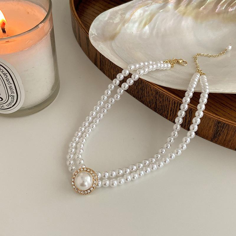 Double-layer pearl necklace niche high-end neck chain women s light luxury design clavicle chain new
