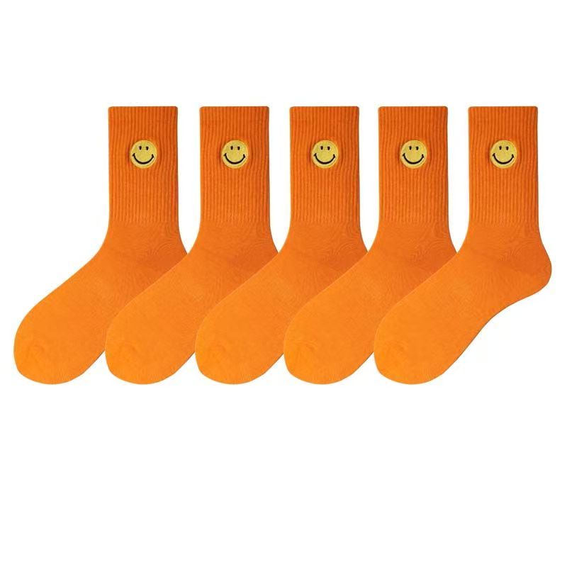 Einfarbige, mittellange Socken mit frischem, lächelndem Gesichtsmuster, schlichtem Design, bequem und atmungsaktiv.