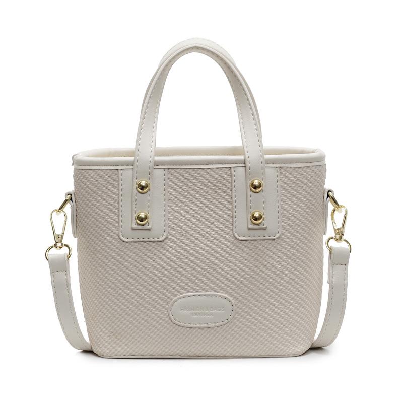 Spring new Korean version casual contrasting color fashionable portable bucket bag women's commuting versatile simple shoulder messenger bag