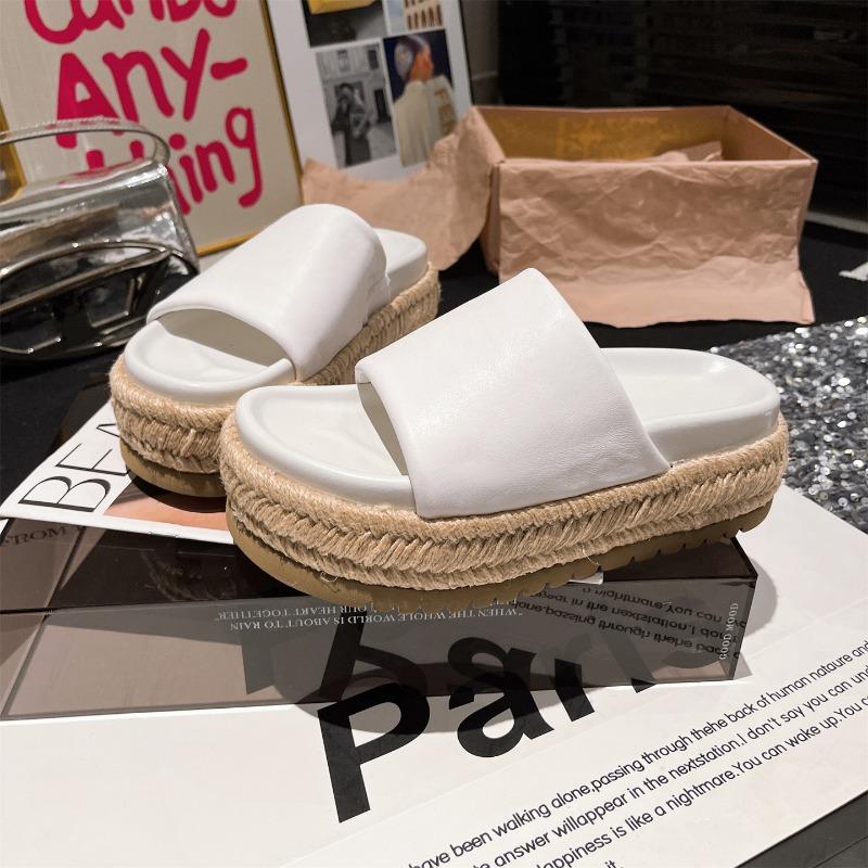 

New leather straw thick-soled muffin slippers wear beach one-word cool slippers women s shoe holders small leather shoes 40