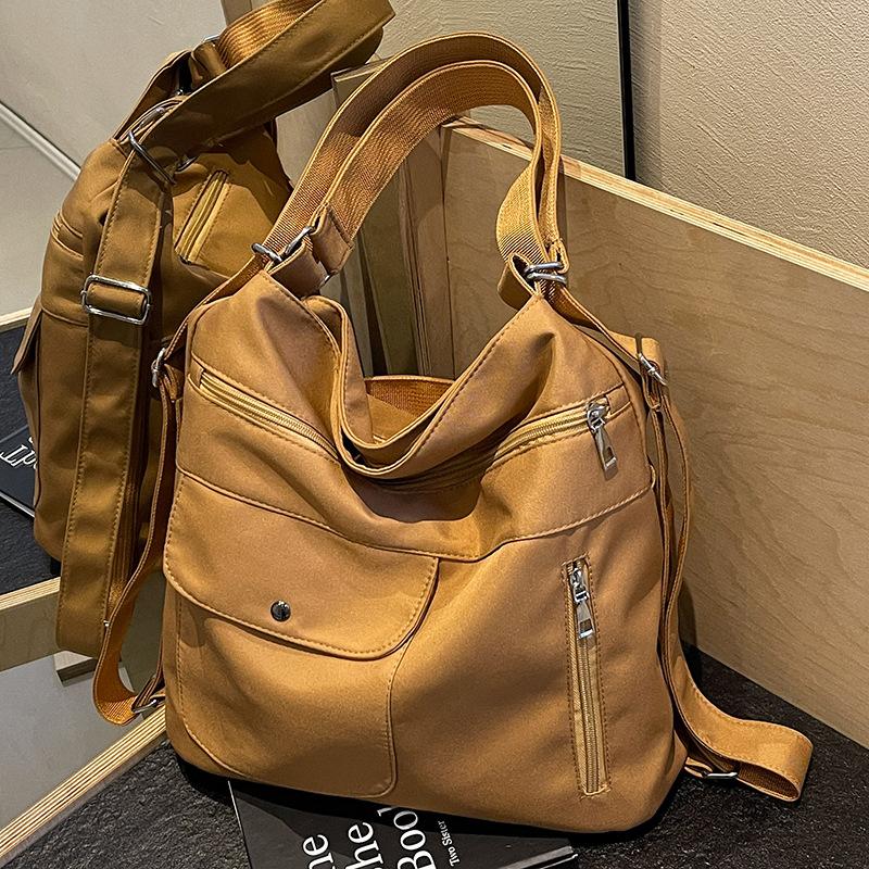 

Женская сумка-тоут 2025 новая рюкзак большой вместимости холщовая универсальная сумка через плечо премиальный рюкзак хаки