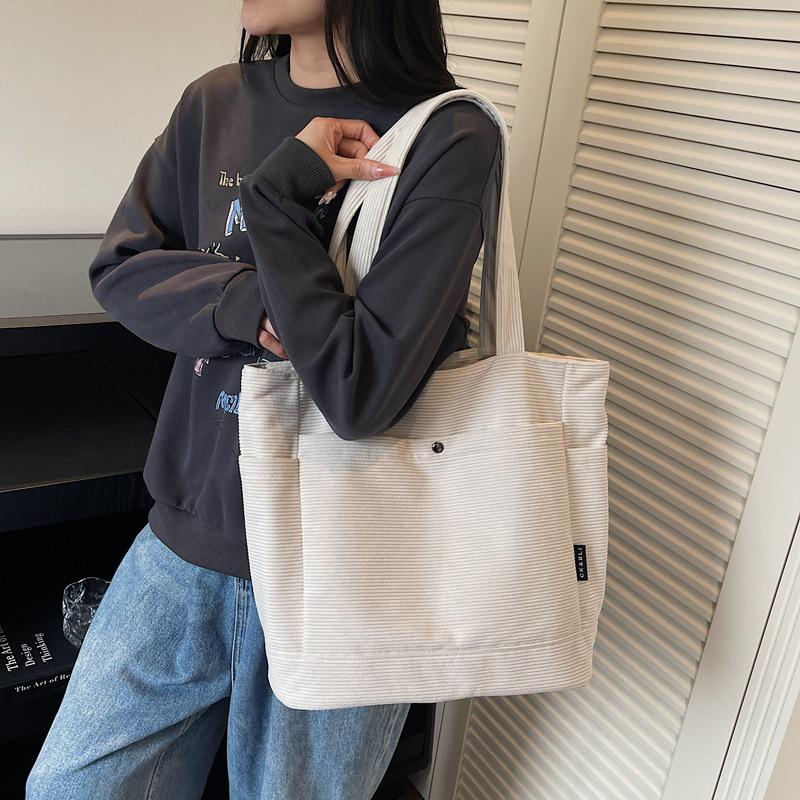 Versatile Canvas Tote - Large Capacity Shoulder Bag for Students