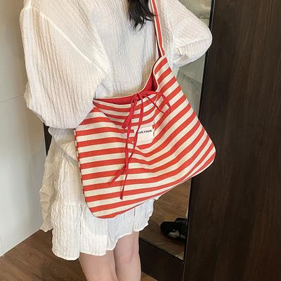 Gestreifte Canvas-Tasche 2025 Neu Korea ins Lazy Wind Tragetasche Student Große Kapazität Lässige Schultertasche Damen
