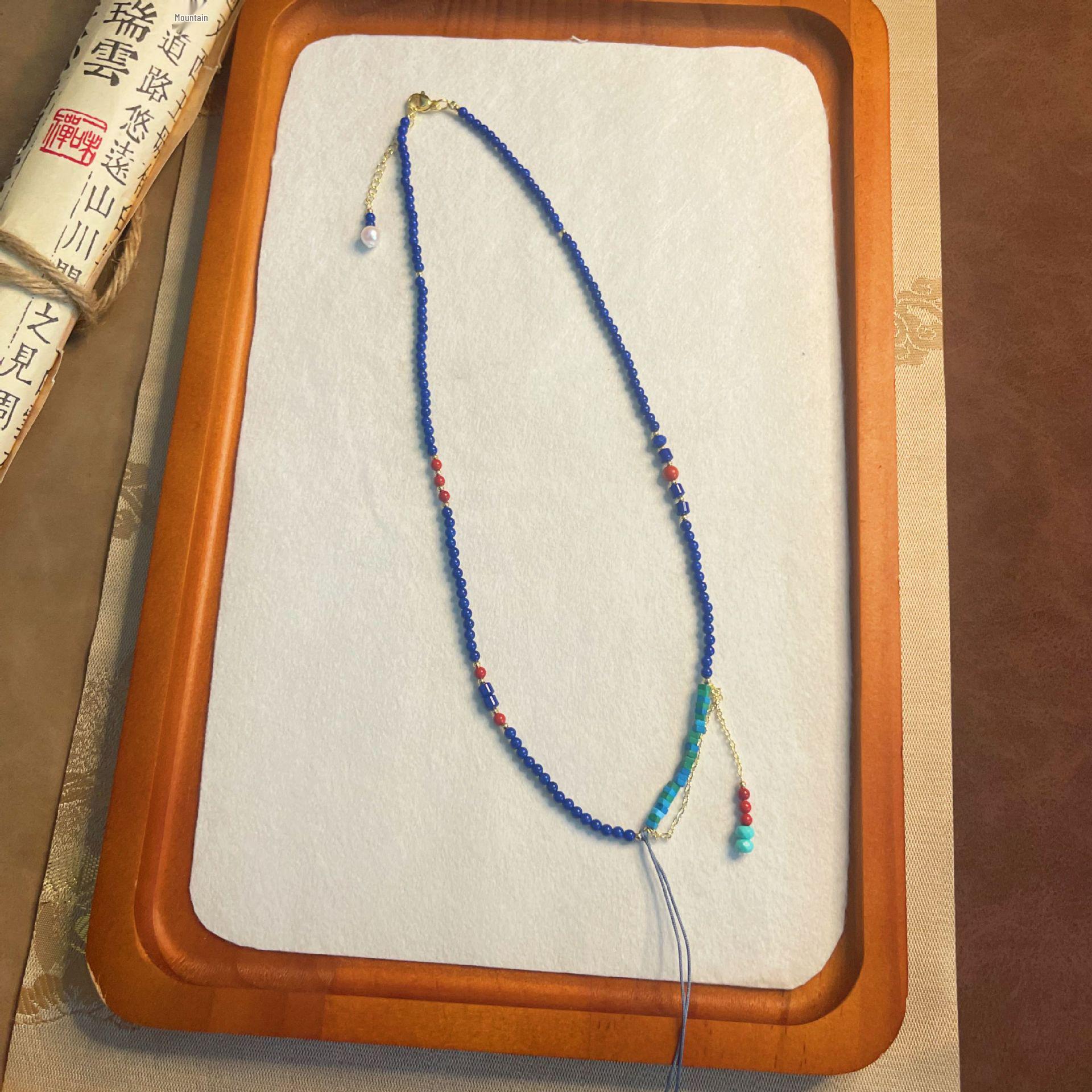 

Elegant Retro Blue Beaded Necklace - Unique, Versatile, and Fashionably Minimalistic Jewelry Cord