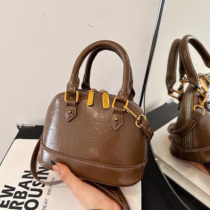 

Супер огонь изысканный мини портативный чехол маленькая женская сумка 2025 новый легкий роскошный нишевый высококачественный сумка-мессенджер 19*10*14