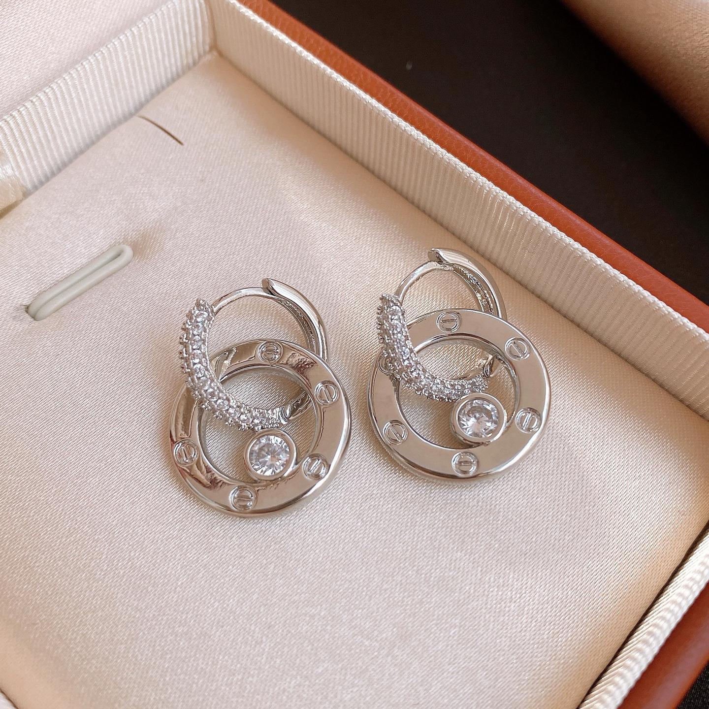 European and American simple metal wind zircon round hollow earrings ear buckles exquisite personalized earrings