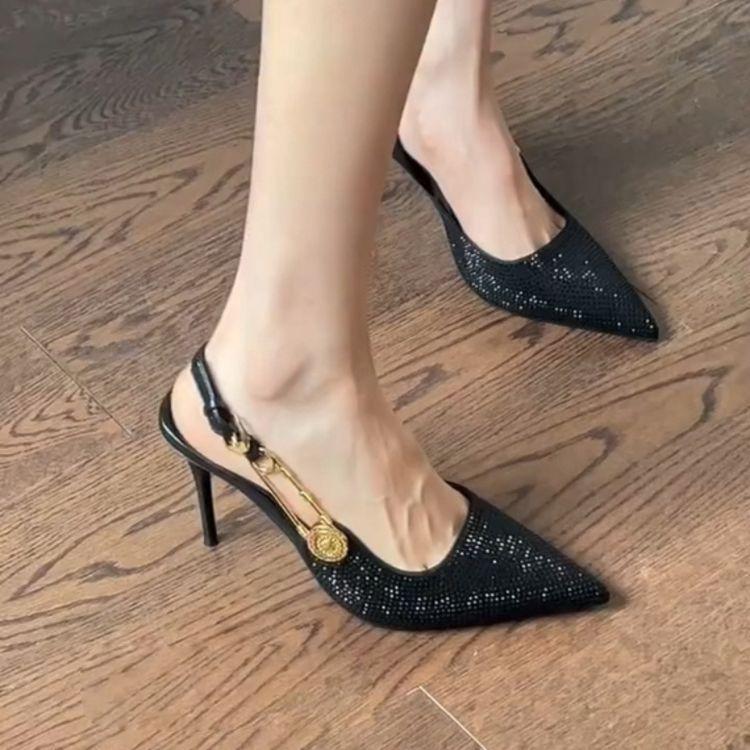 Black rhinestone high heels women's 2025 new pointed thin heel metal one-word buckle celebrity banquet bag head sandals
