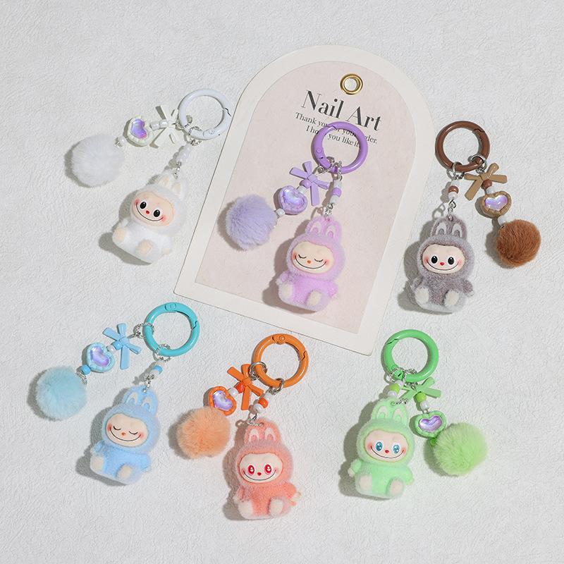 Sitzender Beflockungs-Schlüsselanhänger DIY Niedliche Korn Einzelpuppen-Zubehör Weichkleber Niedliches Korn Baby Lauftasche Handy-Anhänger