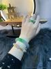 Certified Icy Jadeite Bangle with Green on White Burmese Jade