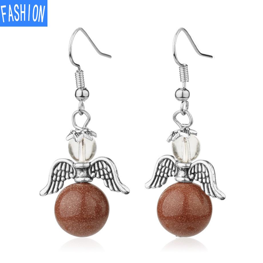 

Европейские и американские безделушки Крылья ангела из натуральных кристаллов Европейские и американские серьги Осенние и зимние женские серьги Каай brown sand