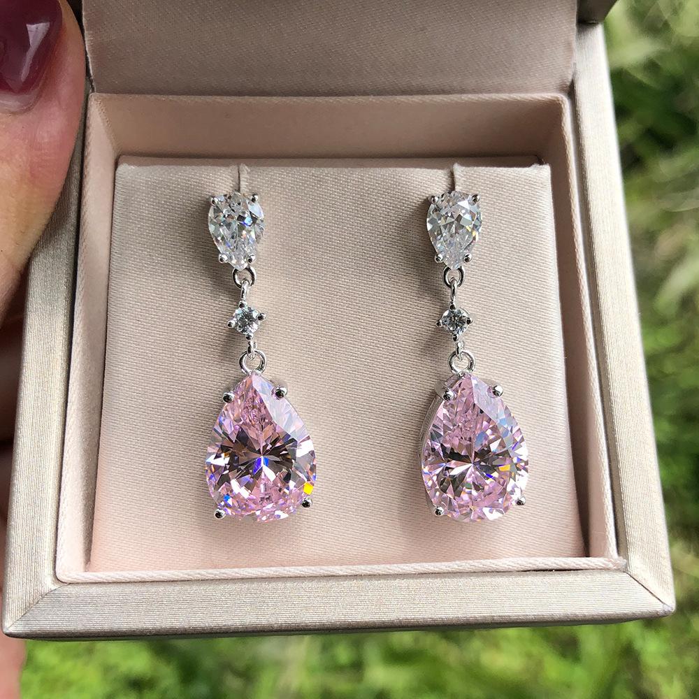 Las joyas Tancise10 * 14 tienen incrustaciones simples de aretes de diamantes con alto contenido de carbono en forma de gota rosa para aretes con soporte independiente para mujer.