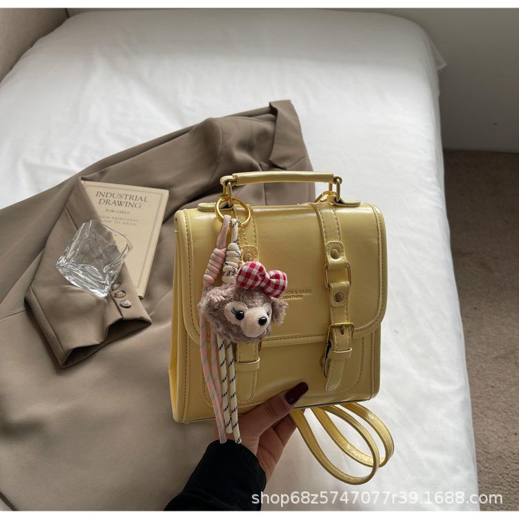 

Retro oil wax leather hand-held backpack for women 2025 new student commuting small backpack high-end shoulder bag