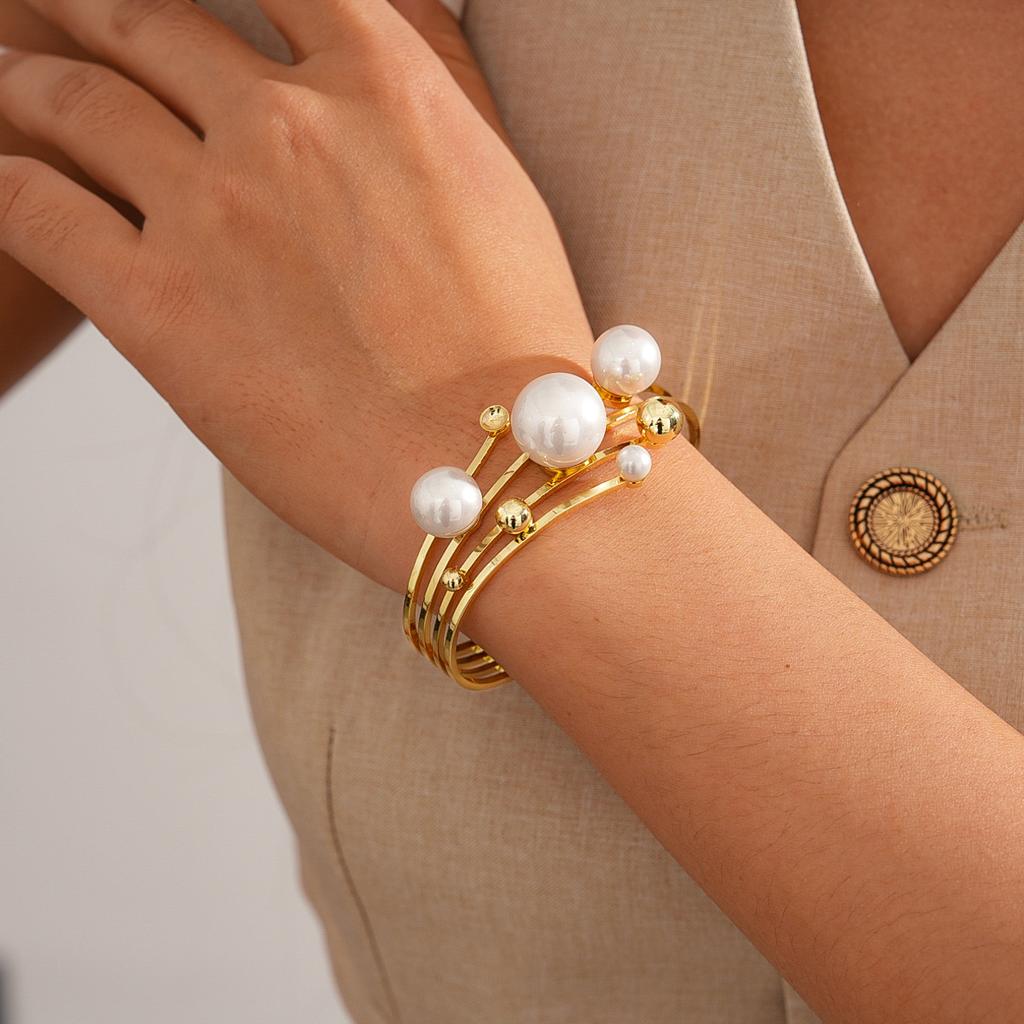 European and American metal sense imitation pearl geometry multi-layer hollow opening bracelet retro elegant jewelry 